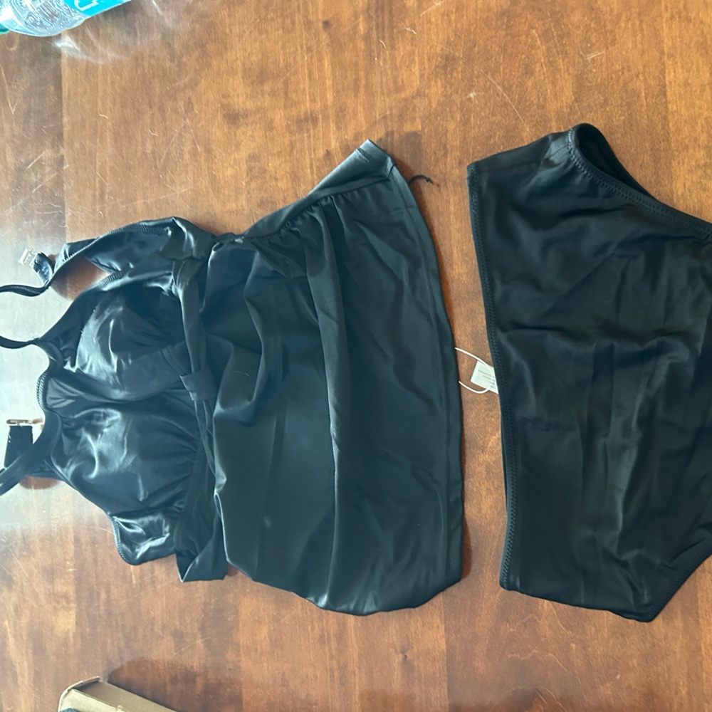 Two piece bathing suit, new with tags.
